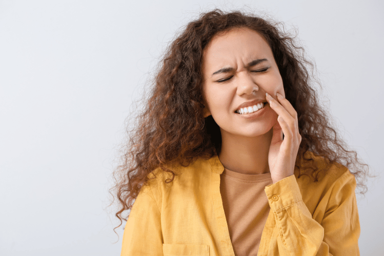 A girl suffering from tooth wear