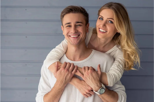 couple with beautiful straight teeth smiling
