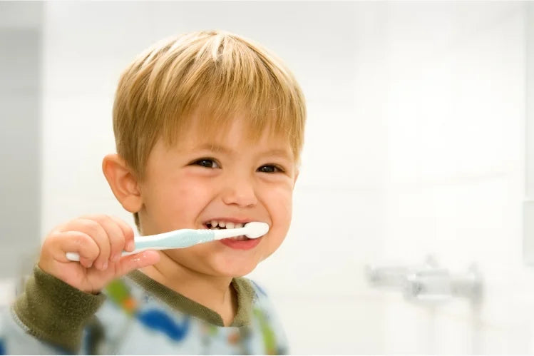 A child brushing his teeth