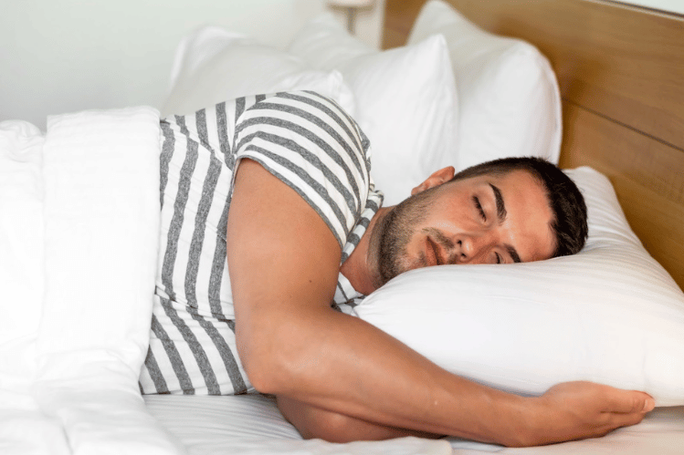 Man comfortably sleeping while clear aligners doing their work