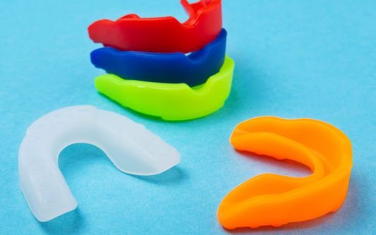 An image showcasing different coloured mouth guards 