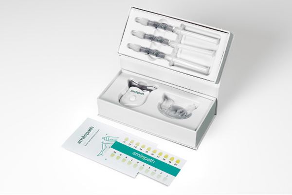 Smilepath at-home teeth whitening placed on a plain surface.