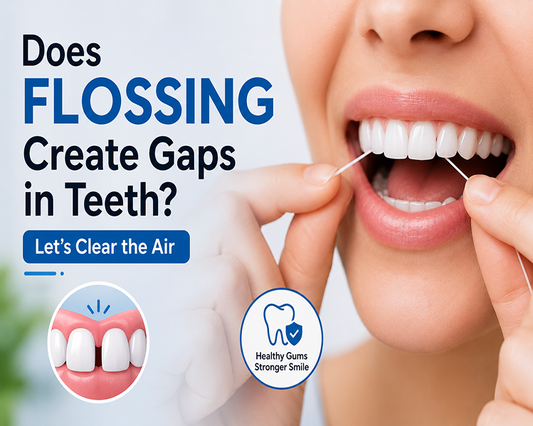 An image shows a girl holding floss in her teeth