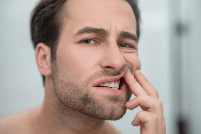 A person with huge gap in front teeth (incisors)
