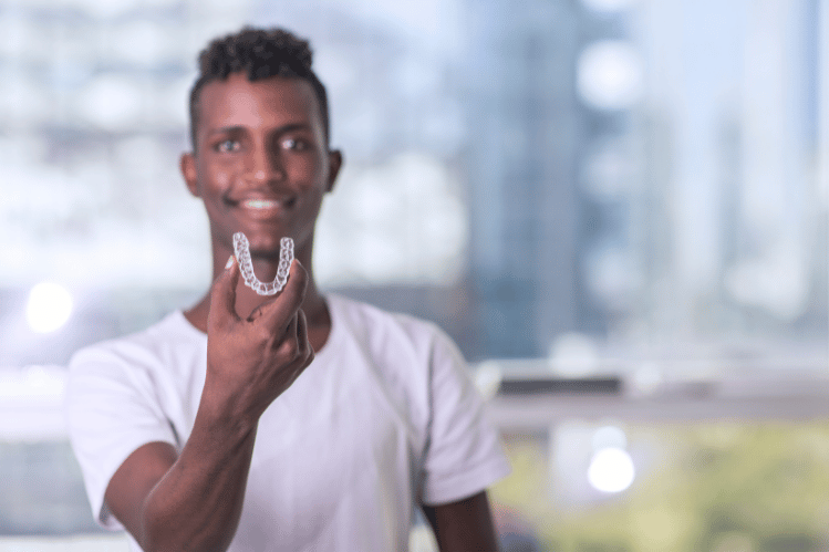 Addressing Canine Impactions with Clear Aligners